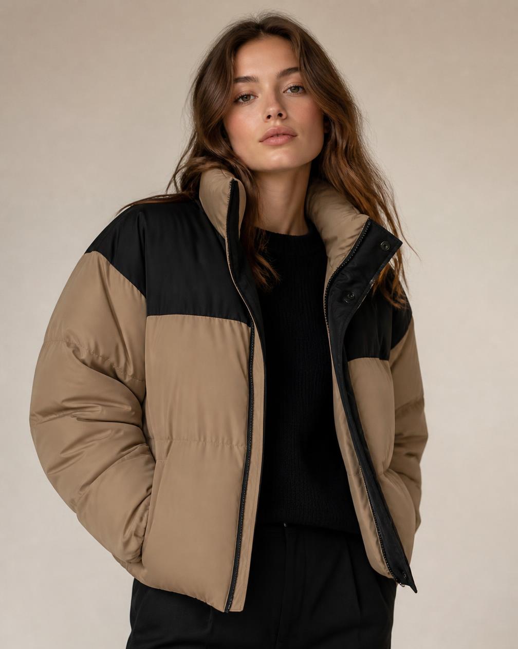 Model wearing the Warmth block puffer in camel and black